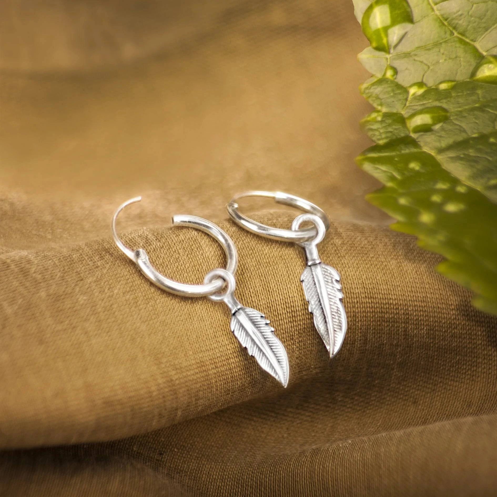 Hoop Earrings with Feather Dangling in Sterling Silver