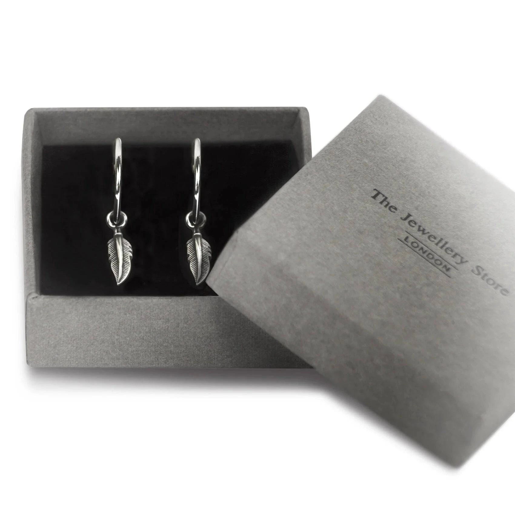Hoop Earrings with Feather Dangling in Sterling Silver