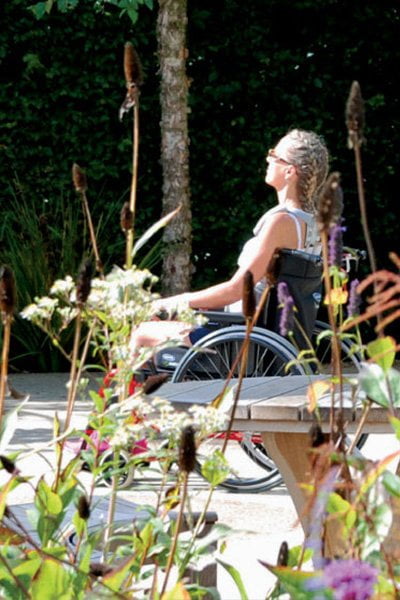 Patients enjoying therapeutic outdoor spaces supported by Horatio's Garden Charity