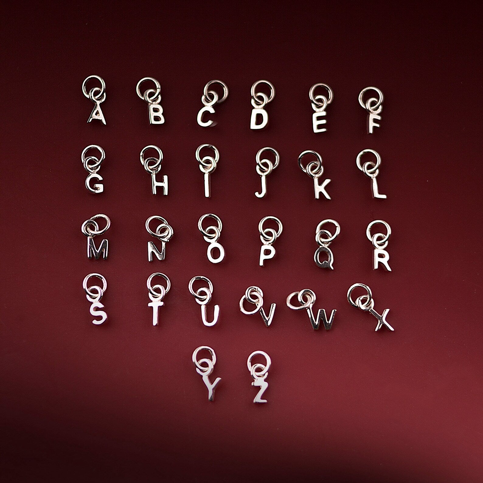 Alphabet charm necklace in sterling silver