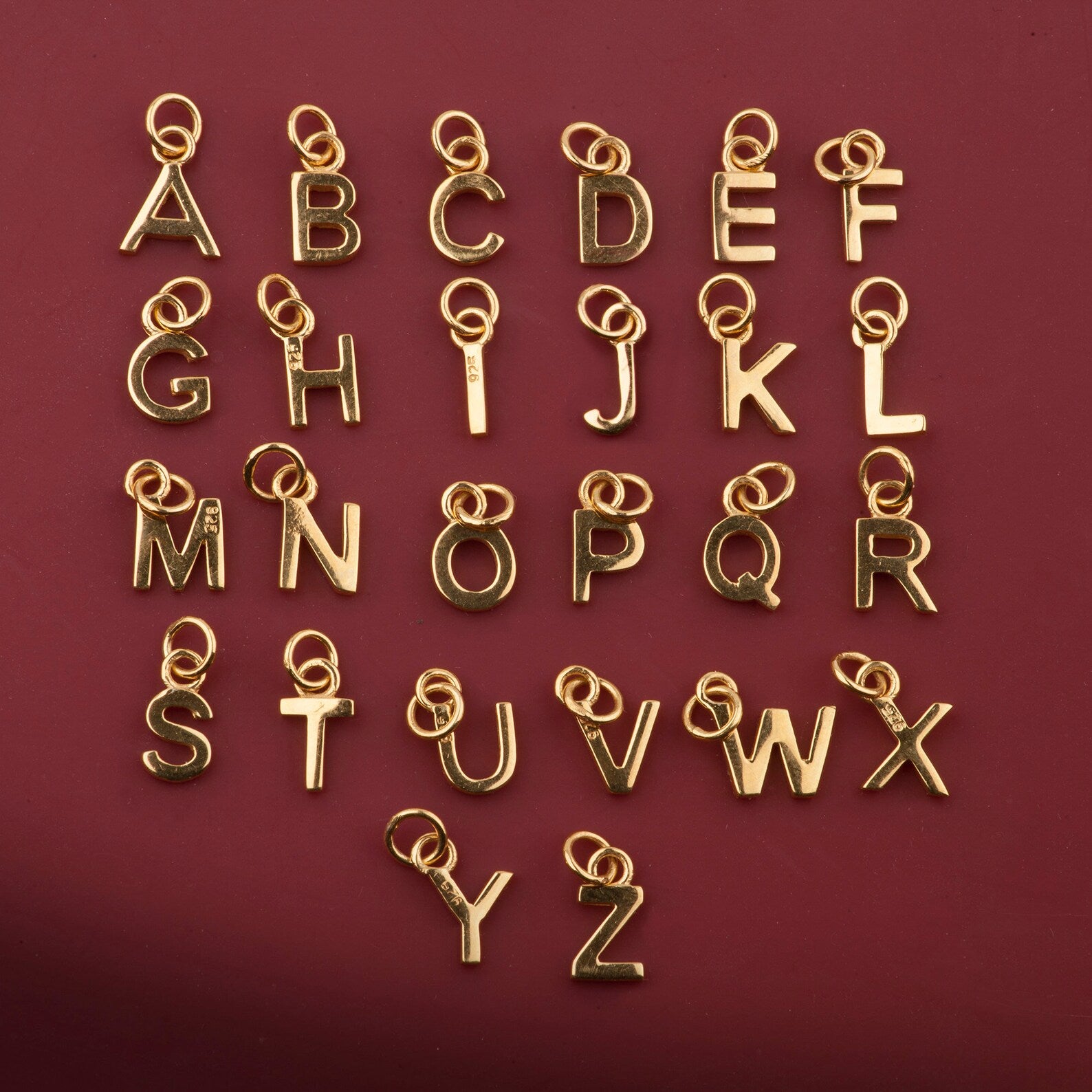 Alphabet charm necklace in gold vermeil