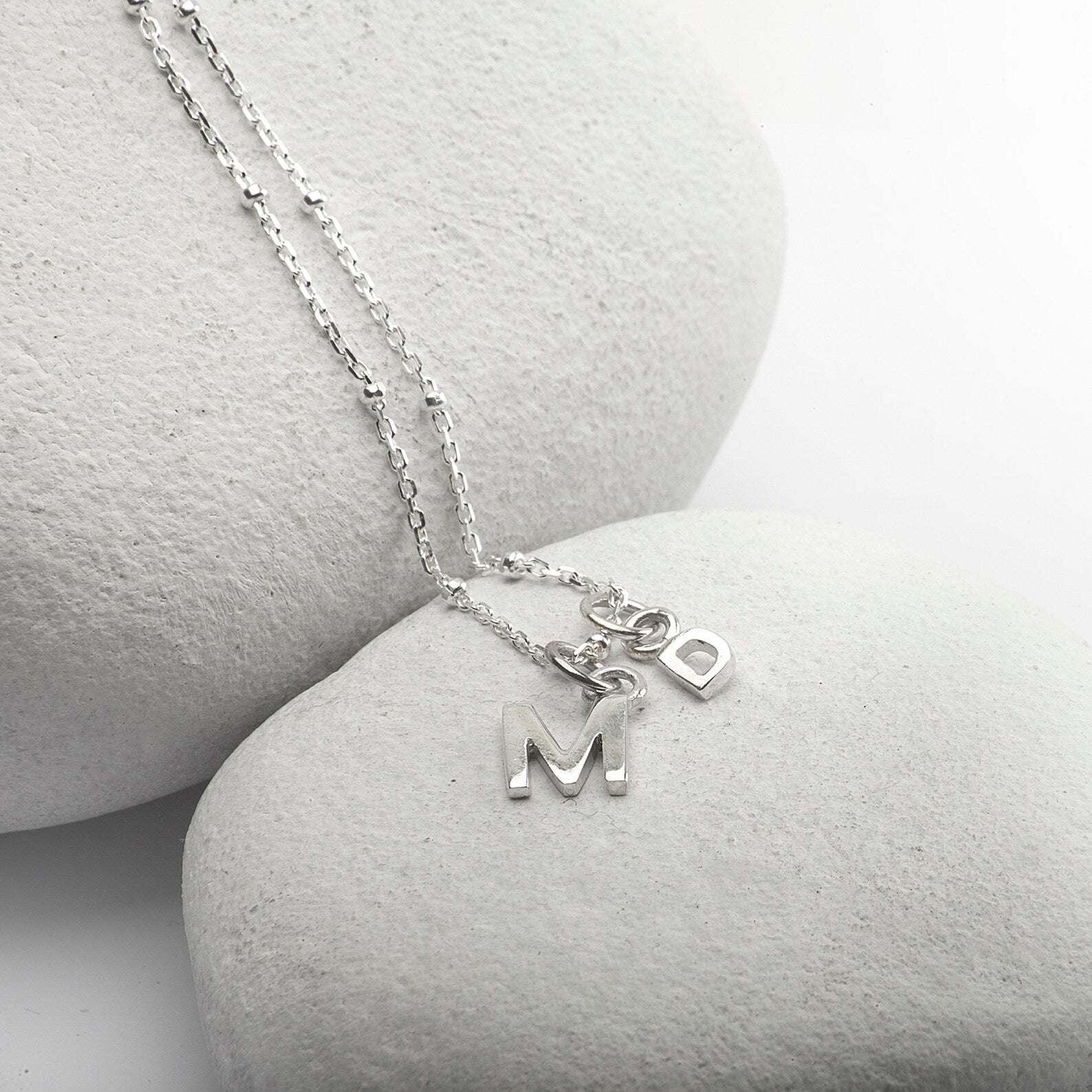 Alphabet charm necklace in sterling silver