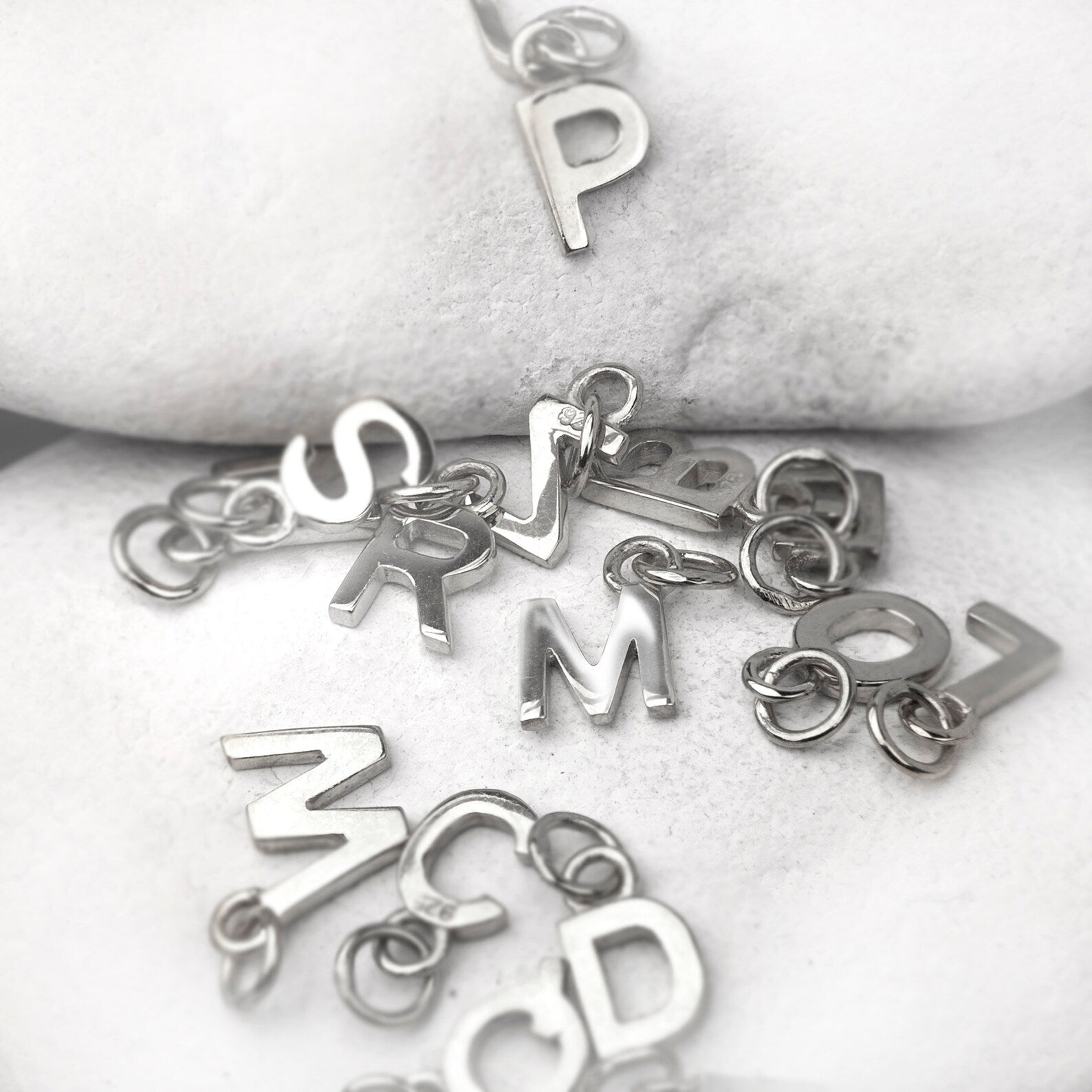 Alphabet charm necklace in sterling silver
