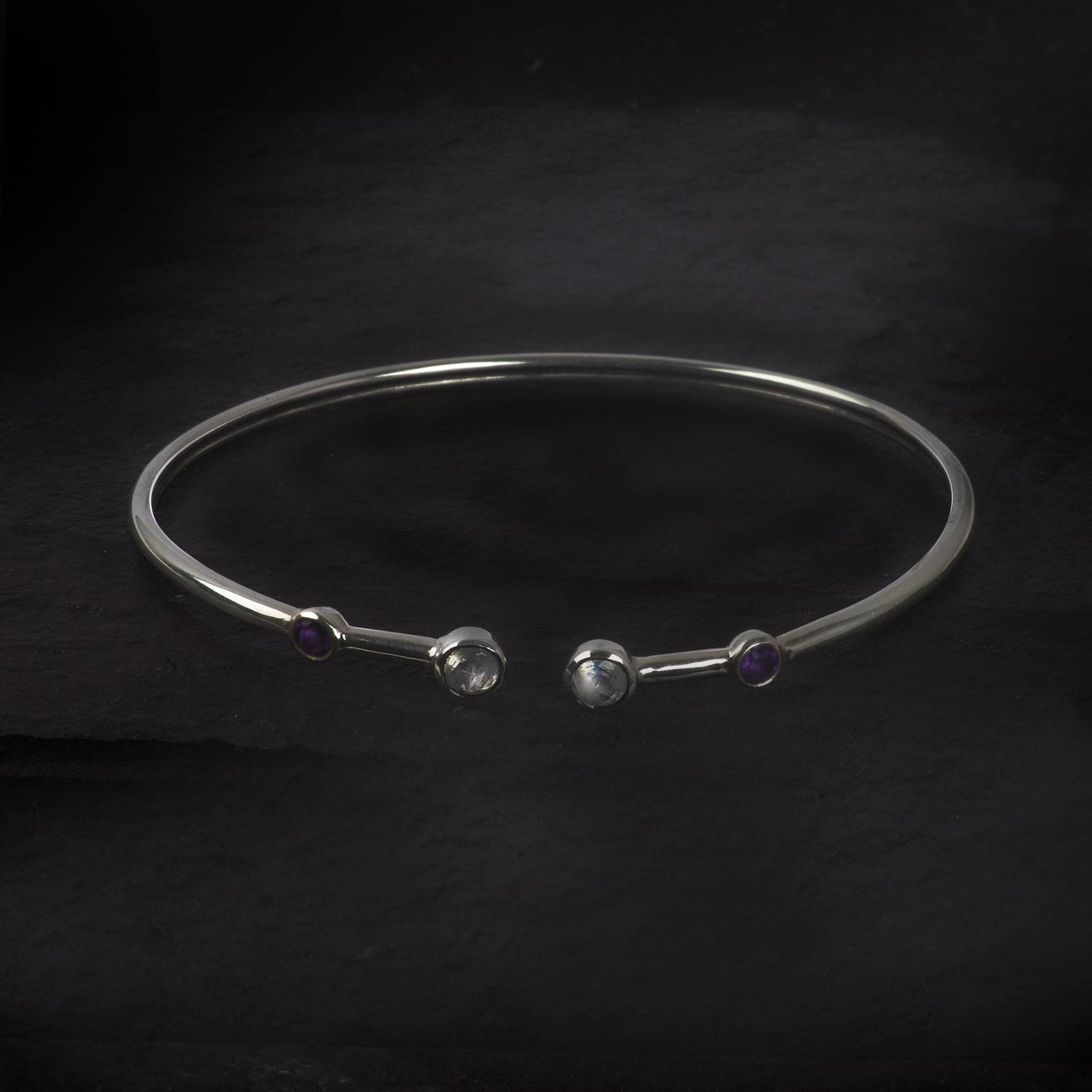 silver bangle with moonstone and amethyst gemstones