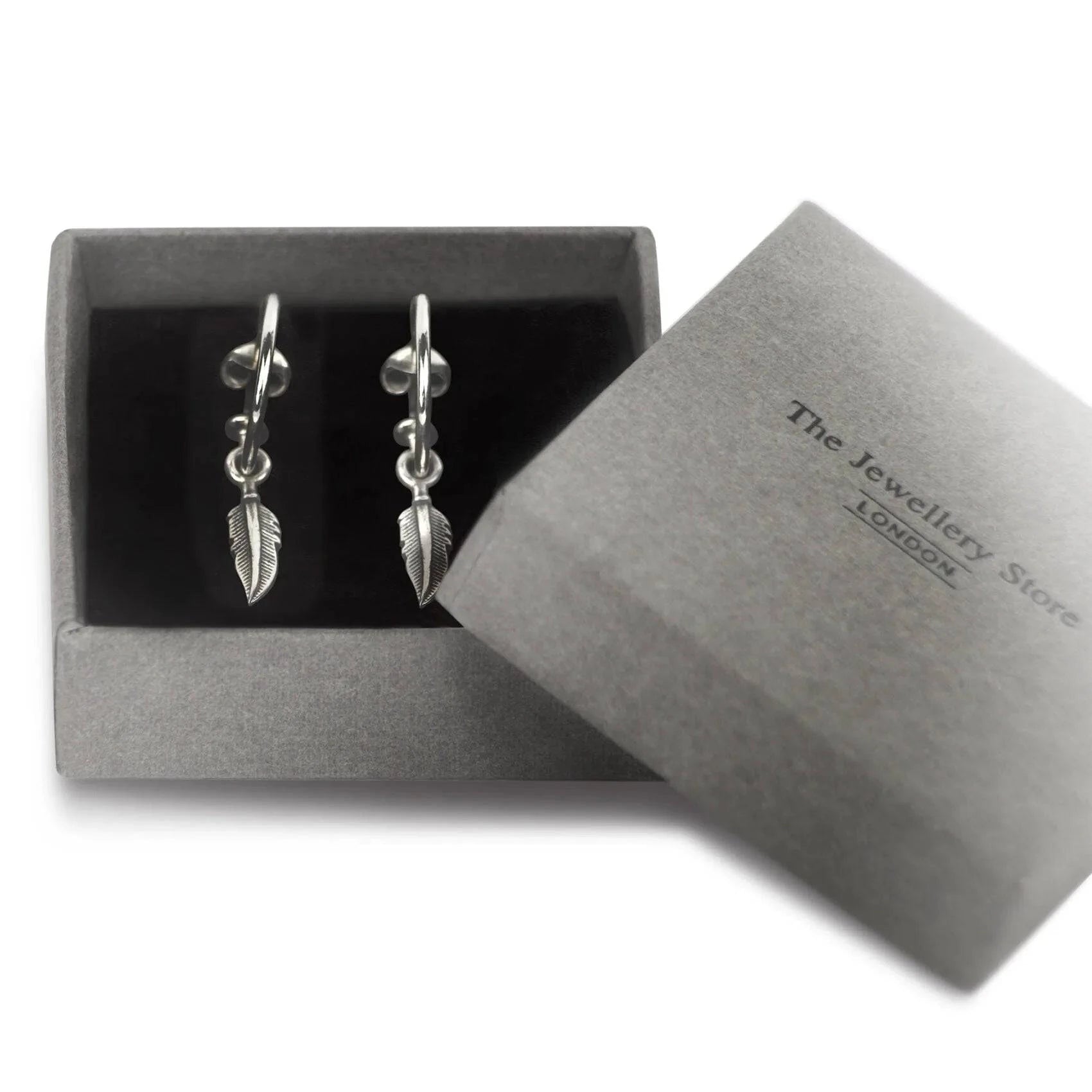 Open Hoop Earrings with Feather Charm in Sterling Silver