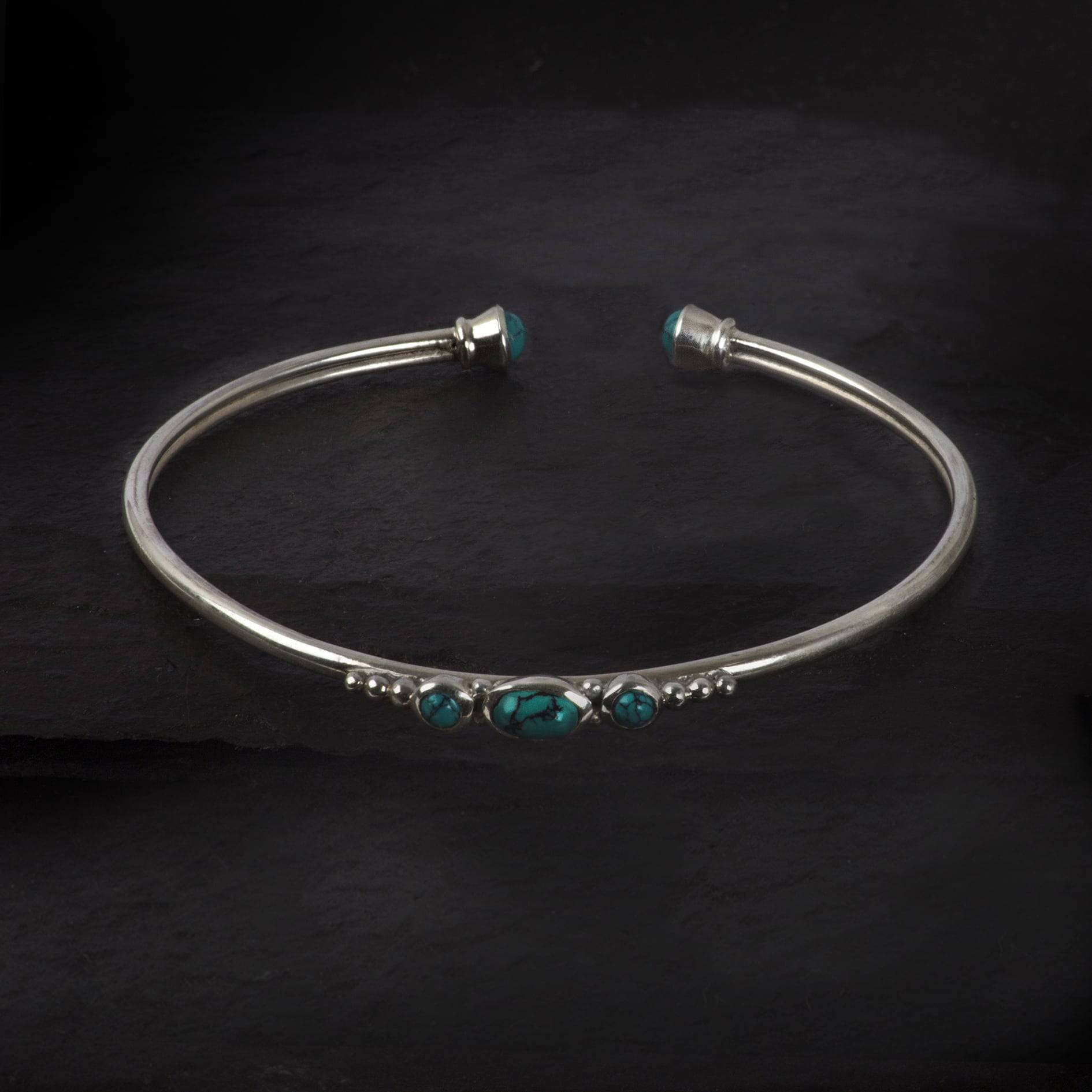 silver bangle bracelet with turquoise gemstones